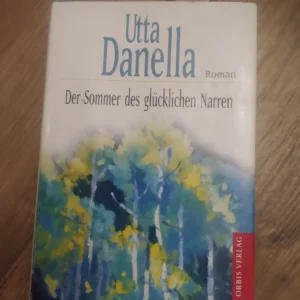 163097810_65c87929a98b41-61210803IMG_20240211_00.webp Der Sommer des Glucklichen Narren - Utta Danella