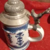 183916179_68ac4a15b1ed58-69083486ddda7ca2-9647-4.webp krigla za pivo sa poklopcem od cina