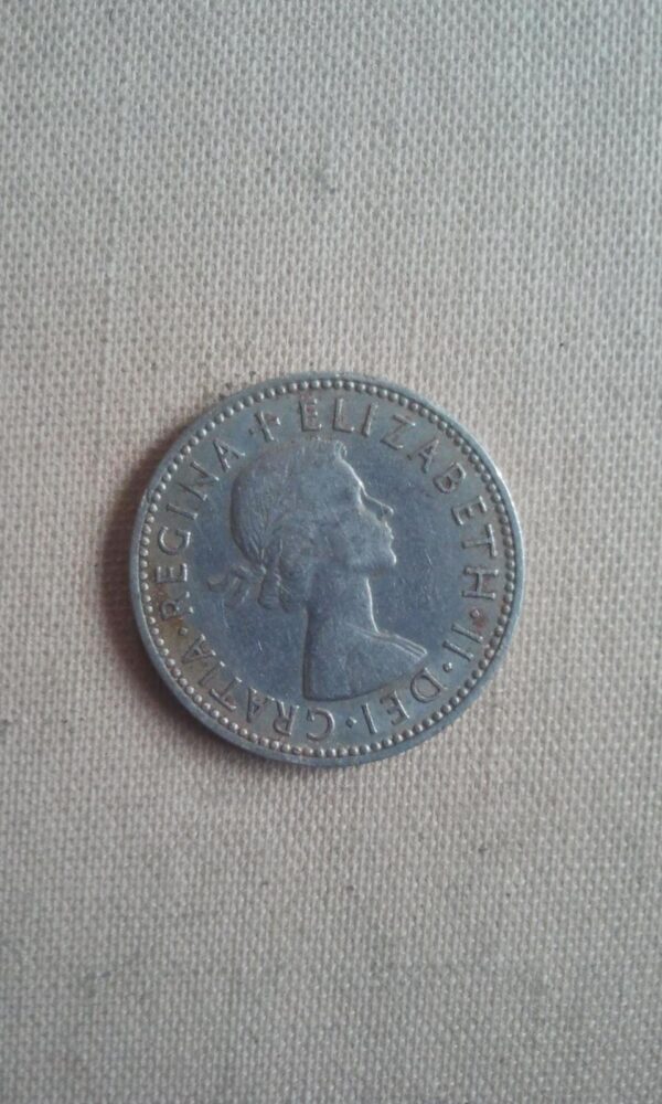 27195334_563f247fe65f49-5530644120151108_112754-1-.jpg velika britanija one shilling 1959-1958
