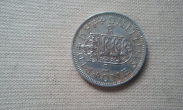 27195334_563f24800cfef0-8168063520151108_112814-1-.jpg velika britanija one shilling 1959-1958